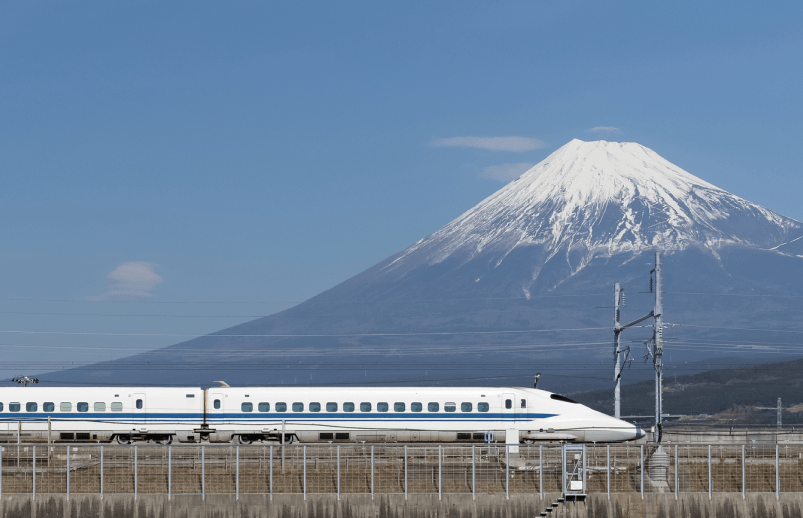 two travelers taking a train